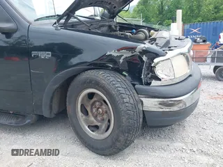 1999 Ford F-150 with VIN 2FTZF1823XCB08827, listed as a IAAI auction lot 42418848 with Not provided miles and . Bid and sale history available at DreamBid. Image 6.