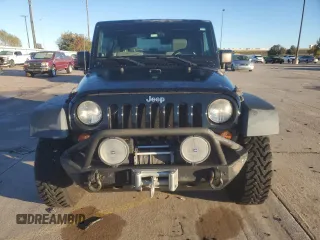 2010 Jeep Wrangler Rubicon with VIN 1J4BA6D10AL203265, listed as a Copart auction lot 79570754 with 114,840 mi miles and Salvage title. Bid and sale history available at DreamBid. Image 5.