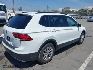 2019 Volkswagen Tiguan S with VIN 3VV1B7AX1KM101407, listed as a IAAI auction lot 42032761 with 51,868 mi miles. Bid and sale history available at carsss.com. Image 4.
