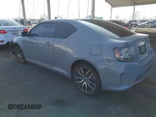 2014 Scion tC with VIN JTKJF5C7XE3079765, listed as a IAAI auction lot 41210220 with 114,410 mi miles. Bid and sale history available at carsss.com. Image 3.