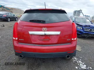 2015 Cadillac SRX Luxury Collection z VIN 3GYFNBE35FS574812, wystawiony jako IAAI lot #42037577 z przebiegiem 94 727 mil mil oraz . Historia ofert i sprzedaży dostępna na DreamBid. Obrazek 17.