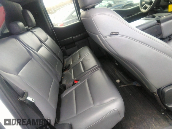 2021 Ford F-150 XL with VIN 1FTEX1EP0MKE07923, listed as a IAAI auction lot 41726506 with 99,518 mi miles and . Bid and sale history available at DreamBid. Image 8.