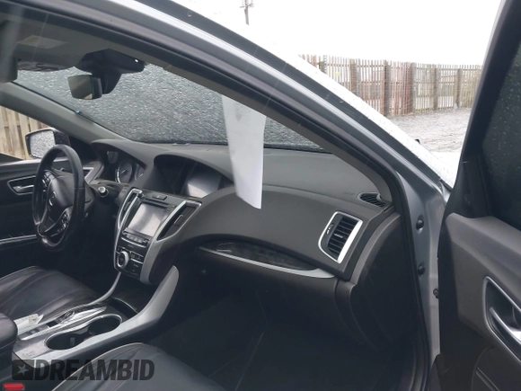 2019 Acura TLX Technology with VIN 19UUB2F42KA007788, listed as a IAAI auction lot 41970877 with 104,356 mi miles and . Bid and sale history available at DreamBid. Image 5.