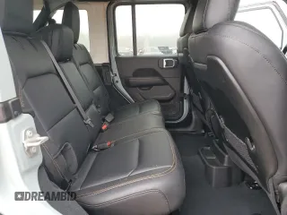 2024 Jeep Wrangler Sahara with VIN 1C4PJXEGXRW210206, listed as a Copart auction lot 58059115 with 14,492 mi miles and Salvage title. Bid and sale history available at DreamBid. Image 11.