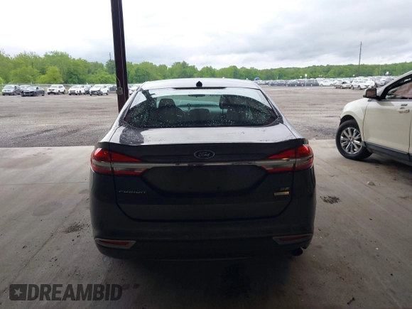 2017 Ford Fusion SE z VIN 3FA6P0HD2HR270782, wystawiony jako IAAI lot #42310190 z przebiegiem 107 133 mil mil oraz . Historia ofert i sprzedaży dostępna na DreamBid. Obrazek 16.