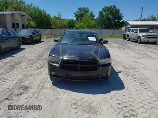 2014 Dodge Charger Police with VIN 2C3CDXAT1EH367015, listed as a IAAI auction lot 42136195 with 121,536 mi miles and . Bid and sale history available at DreamBid. Image 6.