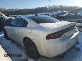 2018 Dodge Charger GT with VIN 2C3CDXJG7JH144197, listed as a Copart auction lot 87977185 with 131,604 mi miles and Salvage Title. Bid and sale history available at DreamBid. Image 2.