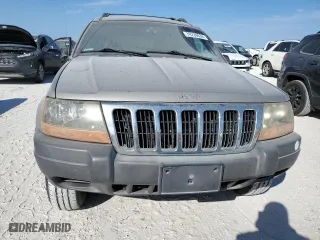 2001 Jeep Grand Cherokee Laredo with VIN 1J4GW48N01C682814, listed as a Copart auction lot 76239634 with 0 mi miles and Salvage Title. Bid and sale history available at carsss.com. Image 5.