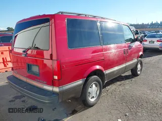 1999 Chevrolet Astro with VIN 1GNEL19W6XB104010, listed as a IAAI auction lot 41403240 with 96,904 mi miles. Bid and sale history available at carsss.com. Image 4.