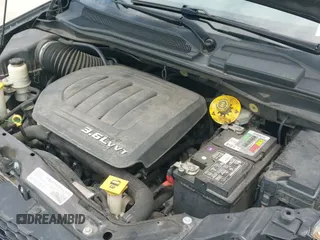 2018 Dodge Grand Caravan SE z VIN 2C4RDGBG6JR180381, wystawiony jako IAAI lot #42922468 z przebiegiem 94 705 mil mil oraz . Historia ofert i sprzedaży dostępna na DreamBid. Obrazek 19.