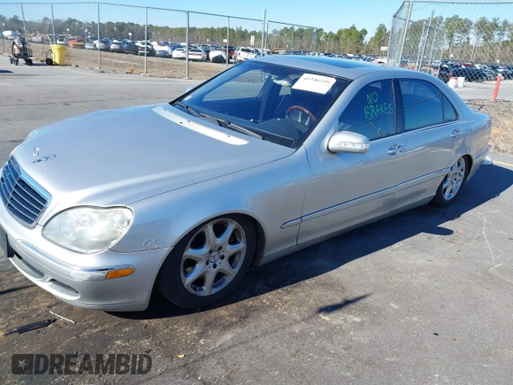 2004 Mercedes-Benz S-Class 5.0L with VIN WDBNG84J74A403779, listed as a IAAI auction lot 41346259 with 224,485 mi miles. Bid and sale history available at carsss.com. Image 2.