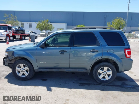 2011 Ford Escape Hybrid with VIN 1FMCU4K30BKC54584, listed as a IAAI auction lot 42131257 with 107,905 mi miles and . Bid and sale history available at DreamBid. Image 14.