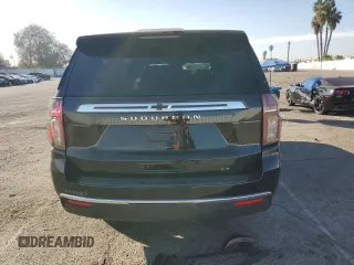 2023 Chevrolet Suburban LT with VIN 1GNSCCKD1PR124986, listed as a Copart auction lot 87432904 with 105,026 mi miles and Salvage Title. Bid and sale history available at DreamBid. Image 6.