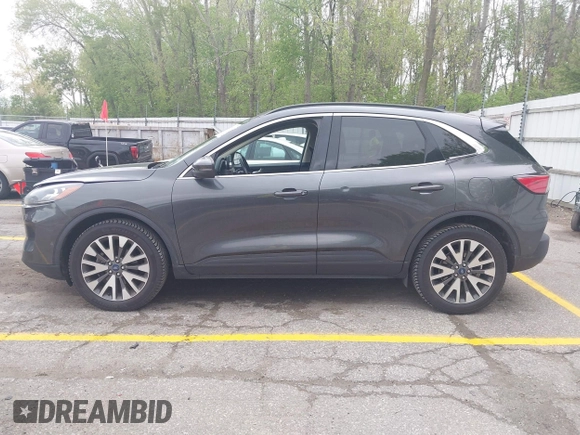 2020 Ford Escape Titanium with VIN 1FMCU9J96LUA00564, listed as a IAAI auction lot 42261152 with 73,748 mi miles and . Bid and sale history available at DreamBid. Image 14.