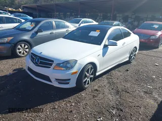 2015 Mercedes-Benz C-Class C 250 with VIN WDDGJ4HB3FG389019, listed as a IAAI auction lot 41220328 with 1 mi miles. Bid and sale history available at carsss.com. Image 2.
