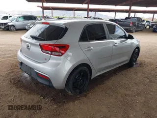 2021 Kia Rio S with VIN 3KPA25ADXME431472, listed as a IAAI auction lot 42030475 with 62,279 mi miles and . Bid and sale history available at DreamBid. Image 4.