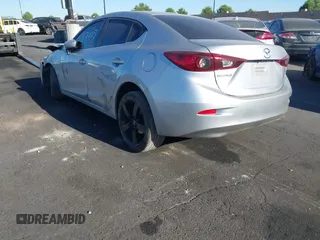 2017 Mazda 3 Touring with VIN JM1BN1V72H1106185, listed as a IAAI auction lot 42697405 with 110,324 mi miles and . Bid and sale history available at DreamBid. Image 3.