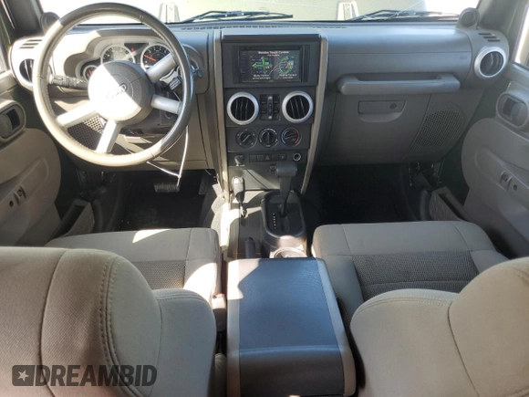 2008 Jeep Wrangler Unlimited Sahara with VIN 1J4GA59148L504608, listed as a Copart auction lot 52400325 with 123,959 mi miles and Salvage Title. Bid and sale history available at carsss.com. Image 8.