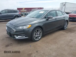 2017 Ford Fusion SE z VIN 3FA6P0H76HR354078, wystawiony jako IAAI lot #42103550 z przebiegiem 103 201 mil mil oraz . Historia ofert i sprzedaży dostępna na DreamBid. Obrazek 17.