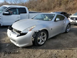 2009 Nissan 370Z z VIN JN1AZ44E39M400425, wystawiony jako Copart lot #80159404 z przebiegiem 60 149 mil mil oraz Szkoda całkowita • Salvage title. Historia ofert i sprzedaży dostępna na DreamBid. Obrazek 1.