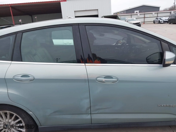 2013 Ford C-Max Hybrid SEL with VIN 1FADP5BU8DL523402, listed as a IAAI auction lot 41676386 with 214,649 mi miles. Bid and sale history available at carsss.com. Image 13.
