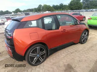2014 BMW i3 with VIN WBY1Z4C57EV276421, listed as a IAAI auction lot 42667600 with 82,105 mi miles and . Bid and sale history available at DreamBid. Image 4.