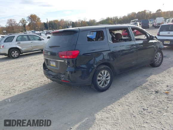 2021 Kia Sedona LX with VIN KNDMB5C1XM6673667, listed as a IAAI auction lot 40759077 with Not Provided miles and . Bid and sale history available at carsss.com. Image 4.