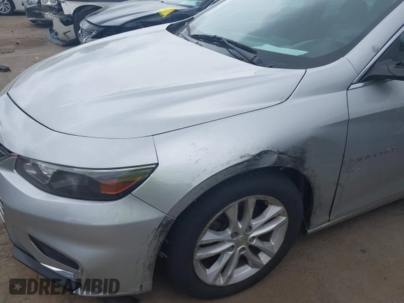 2018 Chevrolet Malibu LT z VIN 1G1ZD5ST7JF150565, wystawiony jako IAAI lot #42069844 z przebiegiem 180 382 mil mil oraz . Historia ofert i sprzedaży dostępna na DreamBid. Obrazek 6.