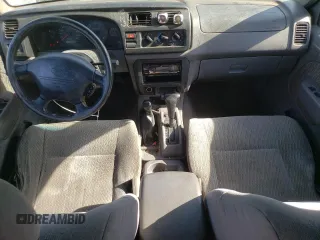 2000 Nissan Frontier XE z VIN 1N6ED27Y3YC324102, wystawiony jako Copart lot #56922155 z przebiegiem 202 233 mil mil oraz Szkoda całkowita • Salvage title. Historia ofert i sprzedaży dostępna na DreamBid. Obrazek 8.