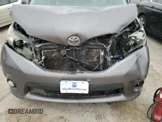 2014 Toyota Sienna SE с VIN 5TDXK3DC1ES519741, выставлен на аукционе Copart как лот 53892035 с пробегом Не указан миль и Списание • Salvage title. История ставок и продаж доступна на DreamBid. Изображение 12.