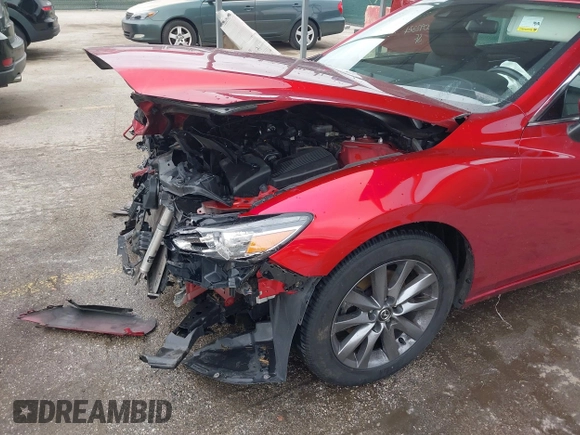 2020 Mazda 6 Sport with VIN JM1GL1UM9L1526019, listed as a IAAI auction lot 42092321 with 73,660 mi miles and . Bid and sale history available at DreamBid. Image 6.