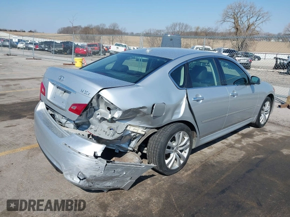 2010 Infiniti M with VIN JN1CY0AR1AM961741, listed as a IAAI auction lot 41905630 with 100,170 mi miles. Bid and sale history available at carsss.com. Image 4.