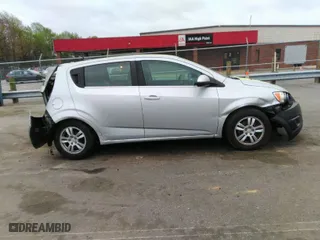 2012 Chevrolet Sonic LT with VIN 1G1JC6SH0C4104592, listed as a IAAI auction lot 41955379 with 198,125 mi miles. Bid and sale history available at carsss.com. Image 14.