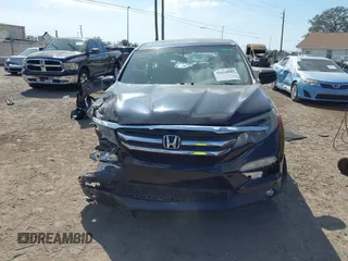 2016 Honda Pilot EX-L with VIN 5FNYF6H74GB048649, listed as a IAAI auction lot 41614843 with 132,264 mi miles. Bid and sale history available at carsss.com. Image 12.