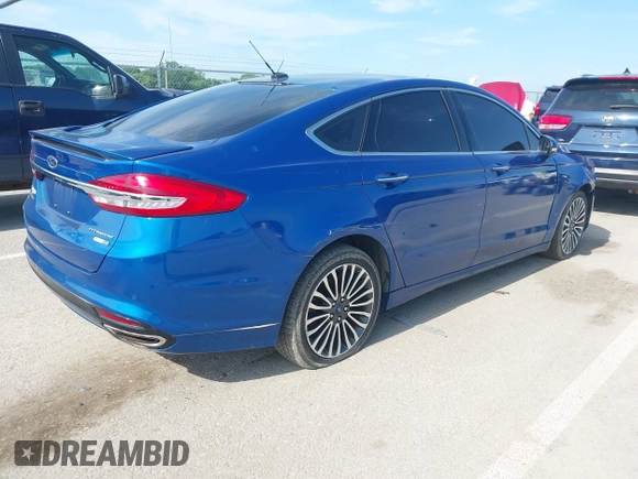 2018 Ford Fusion Titanium with VIN 3FA6P0D92JR205597, listed as a IAAI auction lot 42585935 with 146,072 mi miles and . Bid and sale history available at DreamBid. Image 4.