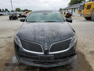 2015 Lincoln MKS z VIN 1LNHL9DK6FG604609, wystawiony jako Copart lot #56243135 z przebiegiem 82 622 mil mil oraz Szkoda całkowita • Salvage title. Historia ofert i sprzedaży dostępna na DreamBid. Obrazek 5.