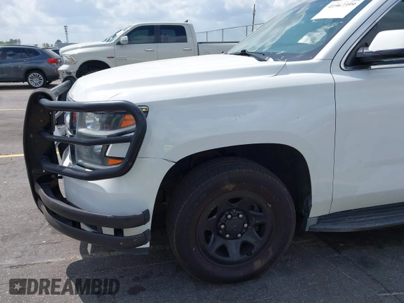 2016 Chevrolet Tahoe Commercial with VIN 1GNLCDEC5GR423300, listed as a IAAI auction lot 41967399 with 147,429 mi miles and . Bid and sale history available at DreamBid. Image 17.
