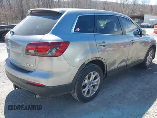 2015 Mazda CX-9 Sport with VIN JM3TB2BA7F0450544, listed as a IAAI auction lot 41812565 with 81,727 mi miles and . Bid and sale history available at carsss.com. Image 4.