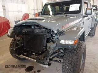 2021 Jeep Gladiator Mojave with VIN 1C6JJTEG1ML596109, listed as a IAAI auction lot 41783913 with 71,112 mi miles and . Bid and sale history available at DreamBid. Image 6.
