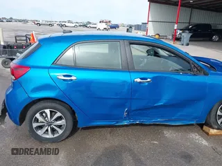 2023 Kia Rio S with VIN 3KPA25AD4PE558982, listed as a IAAI auction lot 41338270 with 40,965 mi miles and . Bid and sale history available at DreamBid. Image 20.