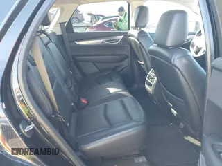 2019 Cadillac XT5 Premium Luxury AWD z VIN 1GYKNFRS1KZ250468, wystawiony jako IAAI lot #41764152 z przebiegiem 107 918 mil mil oraz . Historia ofert i sprzedaży dostępna na DreamBid. Obrazek 8.