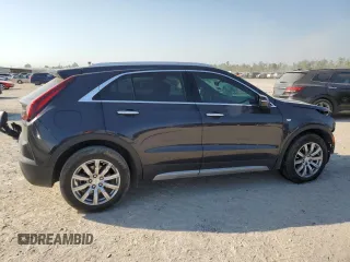 2022 Cadillac XT4 FWD Premium Luxury z VIN 1GYFZCR44NF151123, wystawiony jako Copart lot #50312745 z przebiegiem 46 820 mil mil oraz Szkoda całkowita • Salvage title. Historia ofert i sprzedaży dostępna na DreamBid. Obrazek 3.