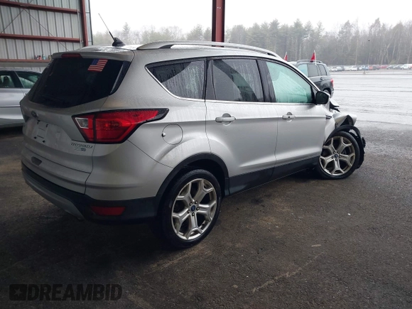 2019 Ford Escape Titanium with VIN 1FMCU9J9XKUA37695, listed as a IAAI auction lot 41868388 with 50,095 mi miles. Bid and sale history available at carsss.com. Image 4.