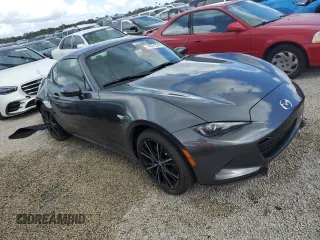 2024 Mazda MX-5 Miata Grand Touring z VIN JM1NDAM73R0603254, wystawiony jako Copart lot #74551704 z przebiegiem Nie podano mil oraz Nie do naprawy • Non repairable. Historia ofert i sprzedaży dostępna na DreamBid. Obrazek 4.
