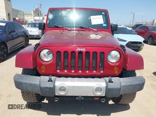 2012 Jeep Wrangler Unlimited Sahara with VIN 1C4BJWEG2CL209600, listed as a IAAI auction lot 42015290 with 133,229 mi miles and . Bid and sale history available at DreamBid. Image 12.