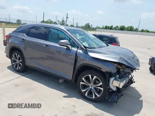 2022 Lexus RX 350 z VIN 2T2HZMAA6NC240640, wystawiony jako IAAI lot #42288197 z przebiegiem 13 166 mil mil oraz . Historia ofert i sprzedaży dostępna na DreamBid. Obrazek 1.