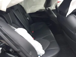 2023 Toyota Camry SE z VIN 4T1G11BK4PU096200, wystawiony jako IAAI lot #41888416 z przebiegiem 25 072 mil mil oraz . Historia ofert i sprzedaży dostępna na DreamBid. Obrazek 8.