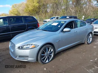2013 Jaguar XF V6 SC with VIN SAJWJ0EF6D8S81203, listed as a IAAI auction lot 40783947 with 77,727 mi miles. Bid and sale history available at carsss.com. Image 2.