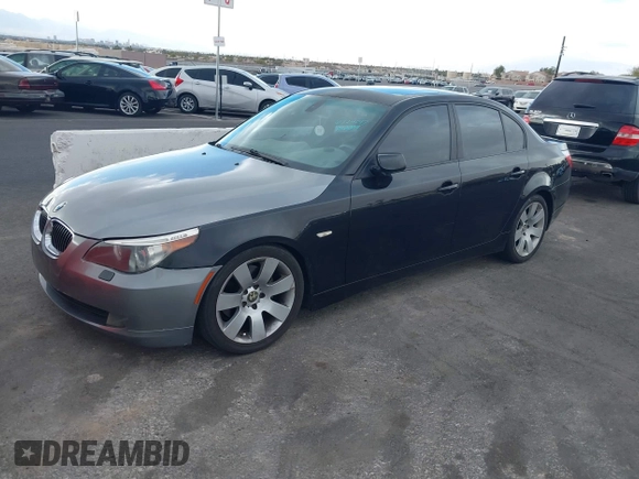2007 BMW 5 Series 530i with VIN WBANE73527CM57227, listed as a IAAI auction lot 41724097 with 181,689 mi miles. Bid and sale history available at carsss.com. Image 2.