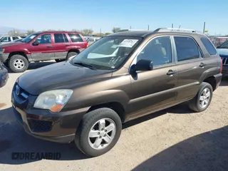 2010 Kia Sportage LX with VIN KNDKGCA32A7666414, listed as a IAAI auction lot 41598263 with 166,882 mi miles and . Bid and sale history available at carsss.com. Image 2.